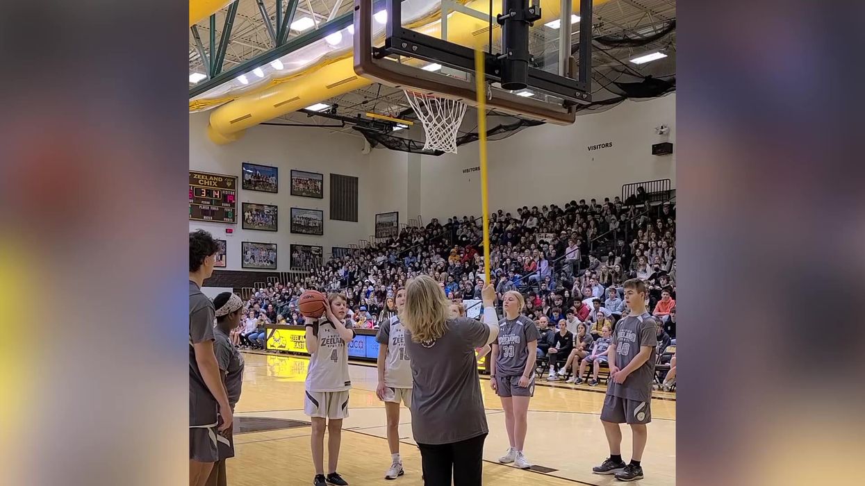 Amazing moment blind girl scores in basketball game in front of huge crowd