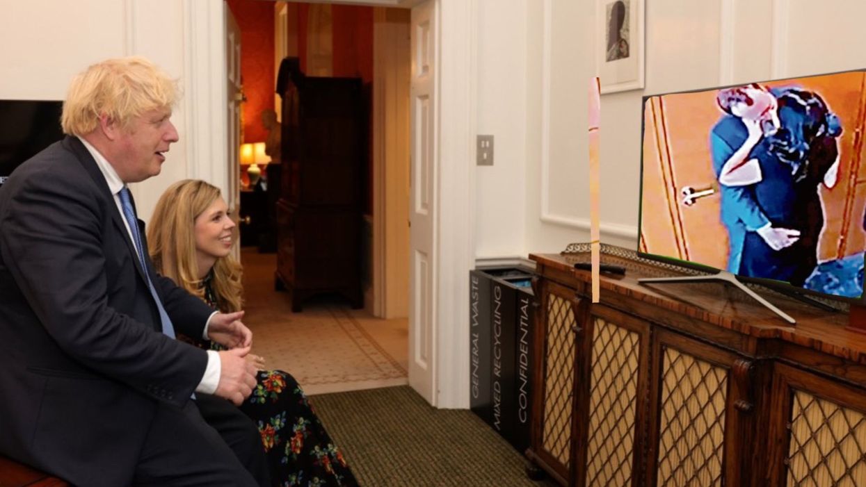 <p>Boris and Carrie watching the, er, big match</p>