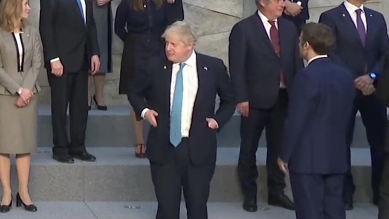 'Embarrassing' Boris Johnson ridiculed as he appears to stand alone amongst world leaders