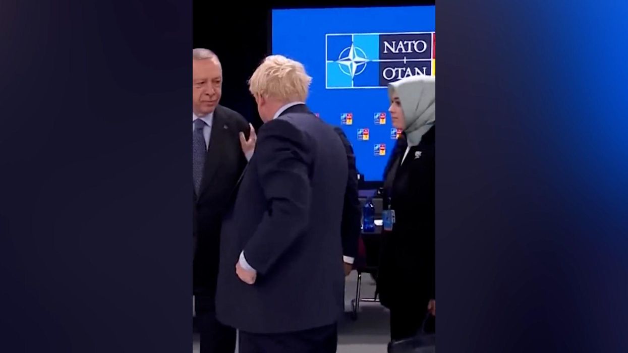 Boris Johnson awkwardly shaking off the Turkish president has become an instant meme