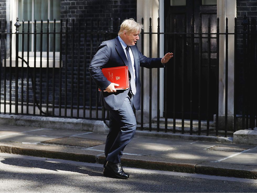 Boris Johnson, Secretary of State for Foreign Affairs, arrives in Downing Street for a cabinet meeting, in central London