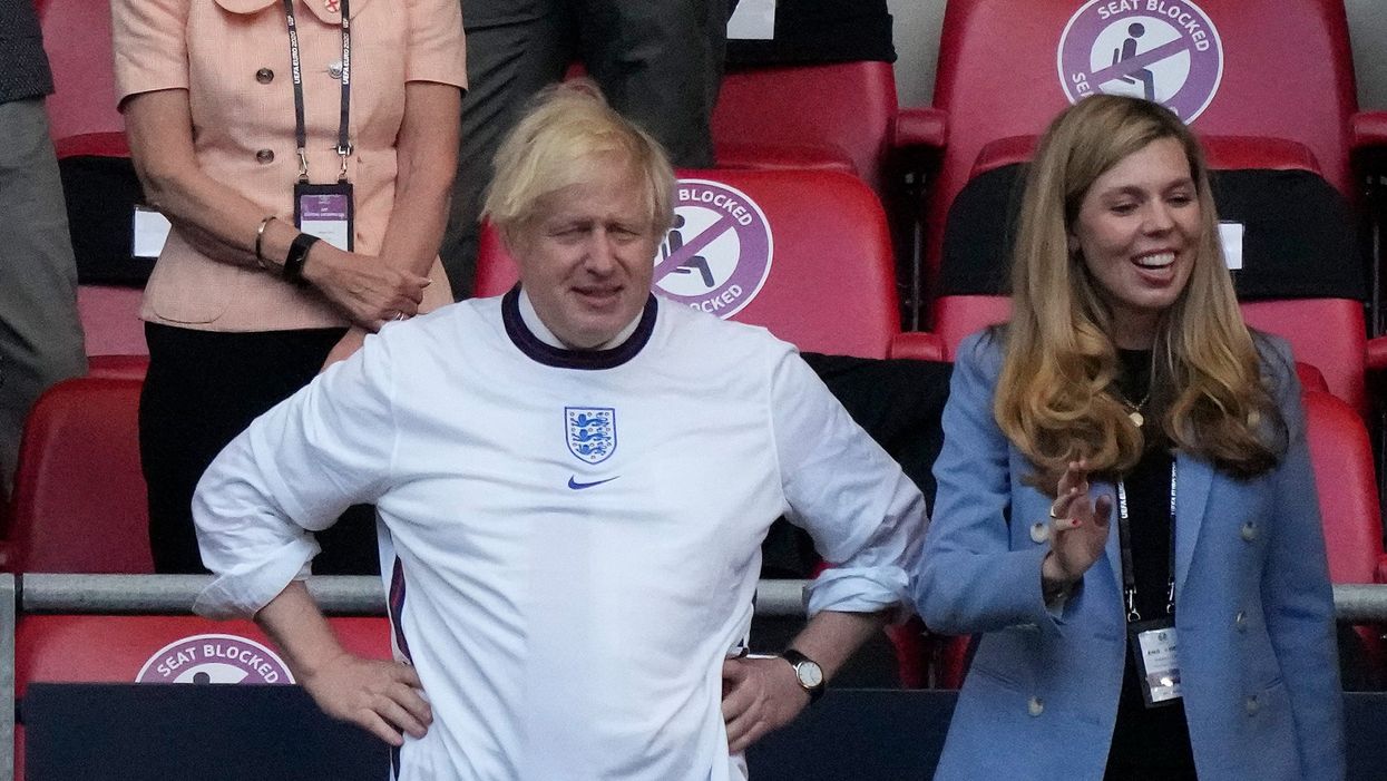 <p> Boris Johnson with his wife Carrie </p>