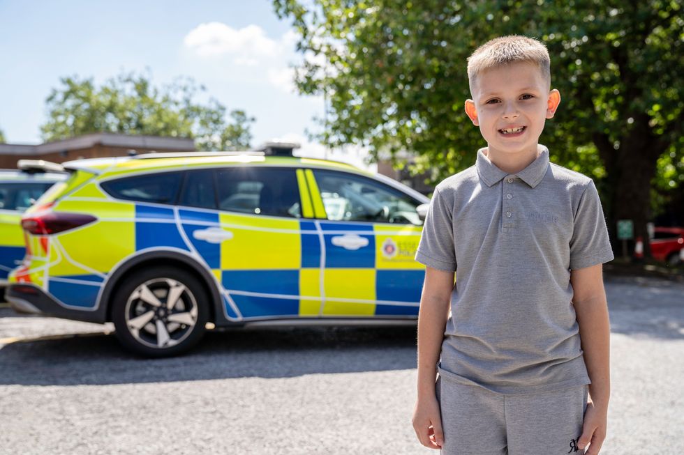 Boy posing and looking at the camera