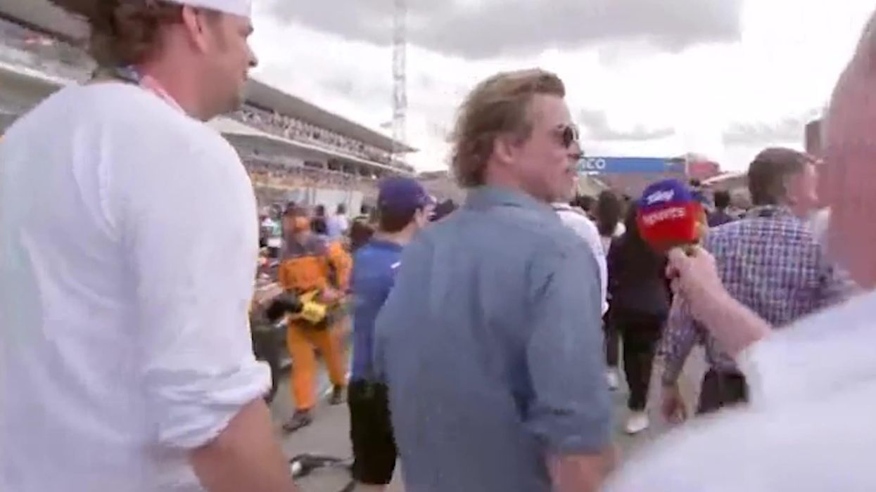 Brad Pitt awkwardly snubs Martin Brundle during F1 grid walk