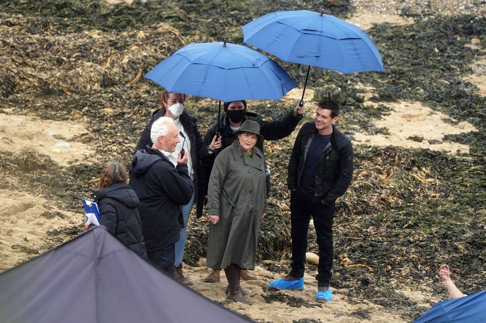 Brenda Blethyn, who plays DCI Vera Stanhope, and Kenny Doughty, who plays DS Aiden Healy, on set during filming of ITV crime drama Vera in Tynemouth, North Tyneside (Owen Humpheys/PA)