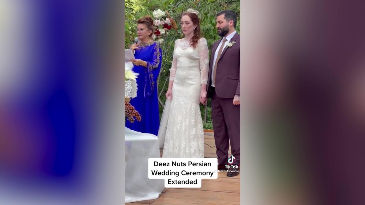 Bride and groom lose it when wedding officiator casually says 'deez nuts'