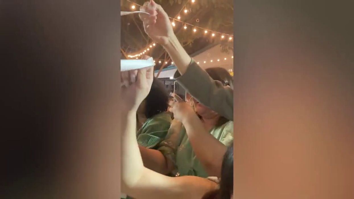 Woman sparks debate by wearing black to wedding