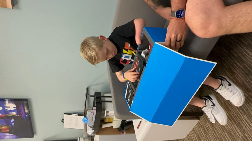 Bristol-based Open Bionics makes the Hero Arm and Jordan received his at the firm's clinic in New York. (Ashley Marotta/ PA)