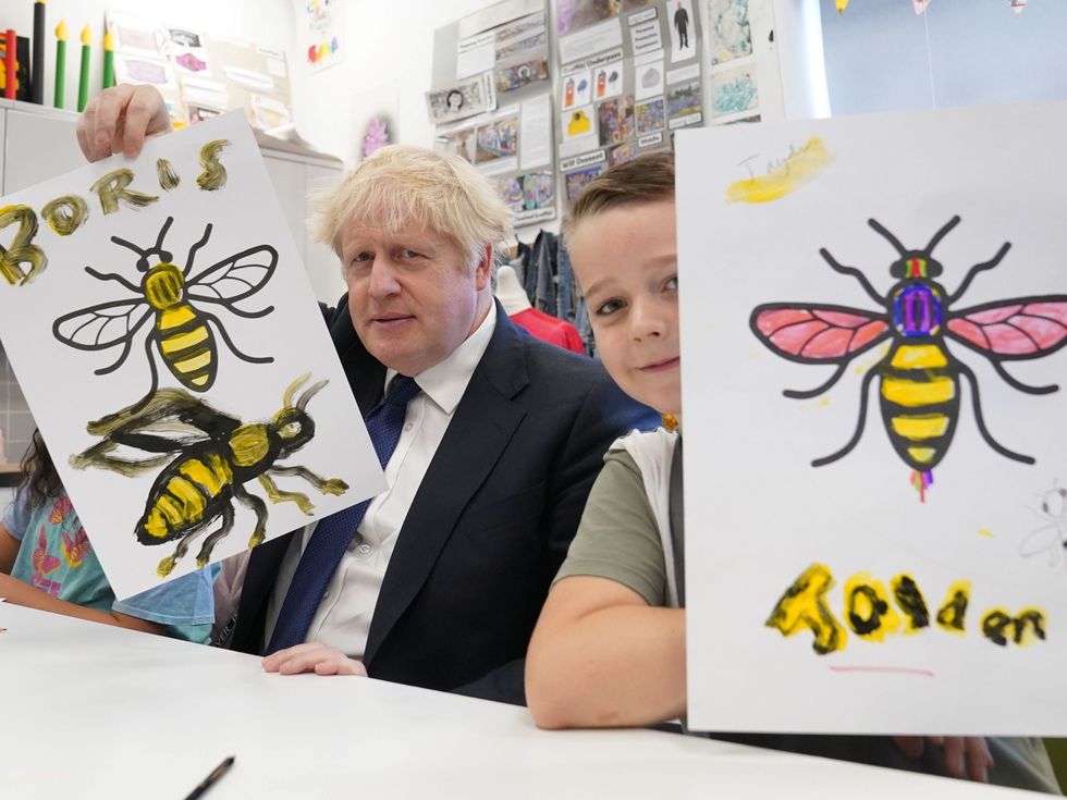Britain's PM Johnson and Home Secretary Patel visit HideOut Youth Zone in Manchester
