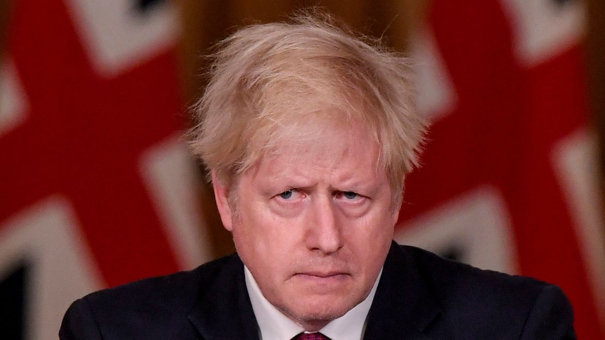 Britain's Prime Minister Boris Johnson holds a news conference in London