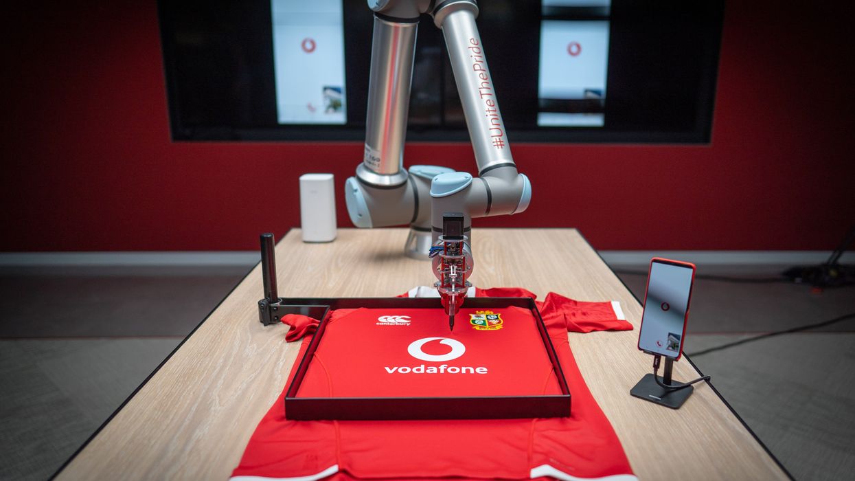 British & Irish Lions located in South Africa sign shirts of fans back in London, using 5G robotic arm