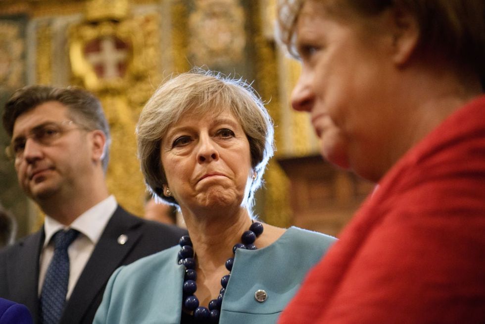 British prime minister Theresa May holds it together in Malta on 3 Feb, as chancellor Merkel tells there's 'someone else'.
