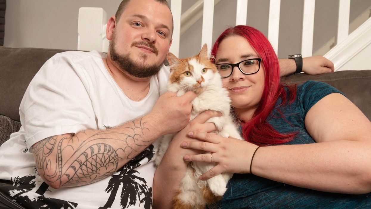 <p>Bruno with his owners Damon and Caroline Green</p>