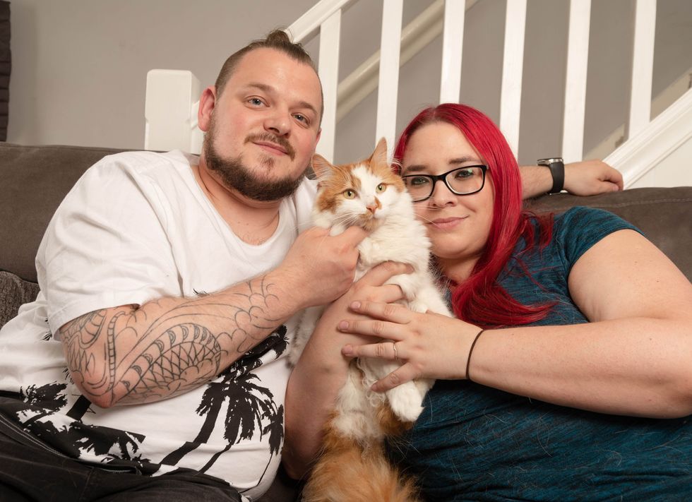 <p>Bruno with his owners Damon and Caroline Green</p>