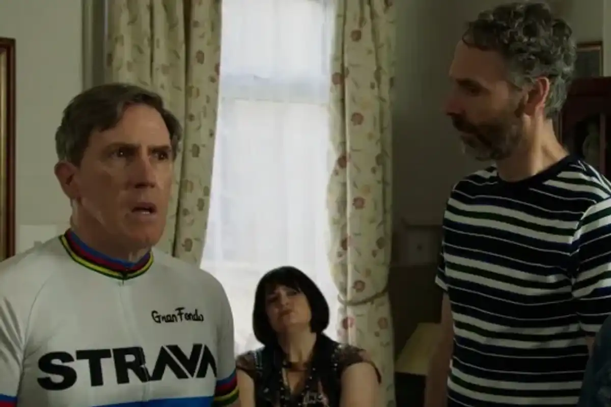 Bryn and Jason stare tensely in a still taken from the Gavin and Stacey finale. Jason wears a striped top, while Bryn wears a cycling top.