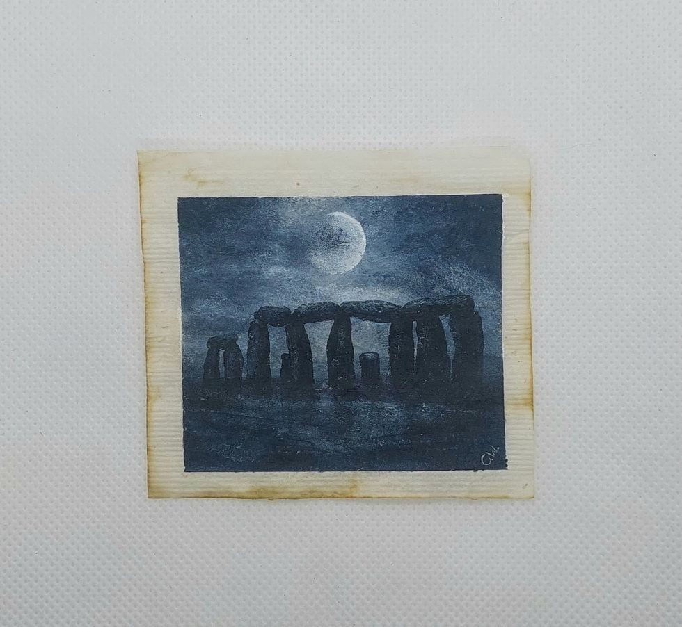 Building painted on tea bag