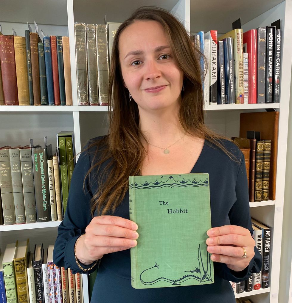 Caitlin Riley with The Hobbit book