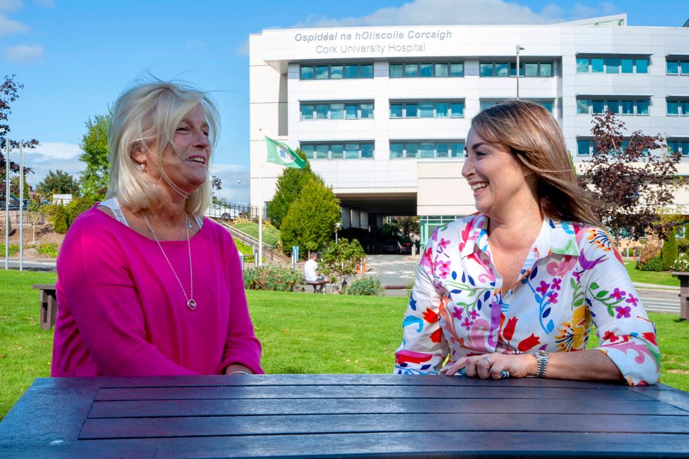 Cancer survivors and friends Sylvia McHenry, left, and Miriam Healy, who raised almost a tenth of the \u20ac550,000 needed to secure the Ion Torrent Sequencer for Cork University Hospital, through Cork Pink Week fundraising events. (Colm Lougheed/PA)