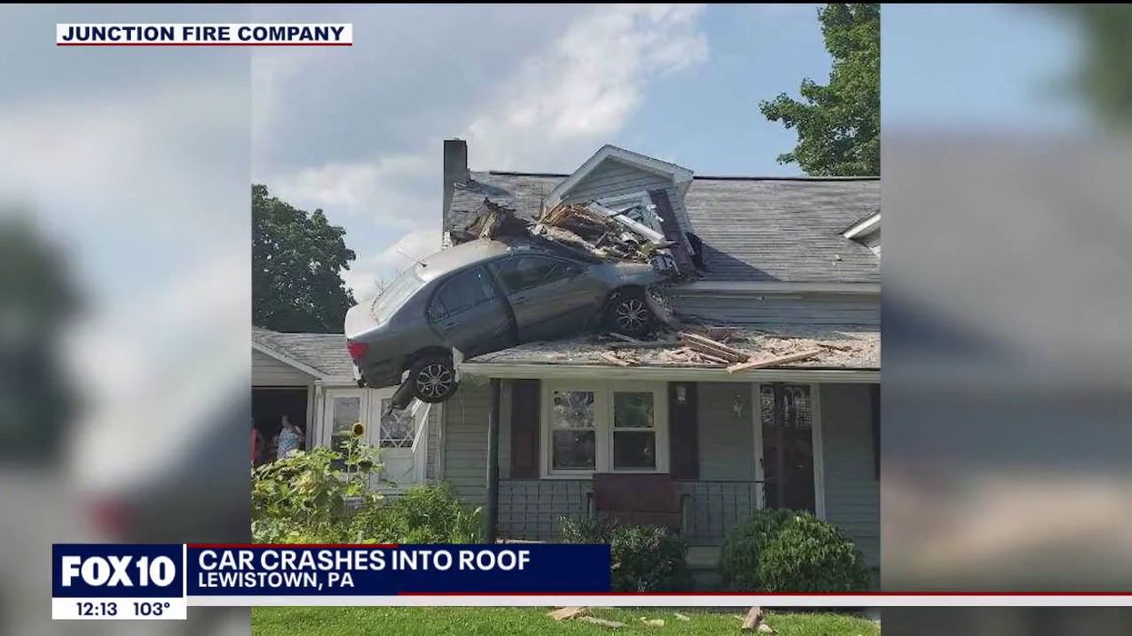 Car crashes into the top floor of a house in bizarre 'intentional' incident