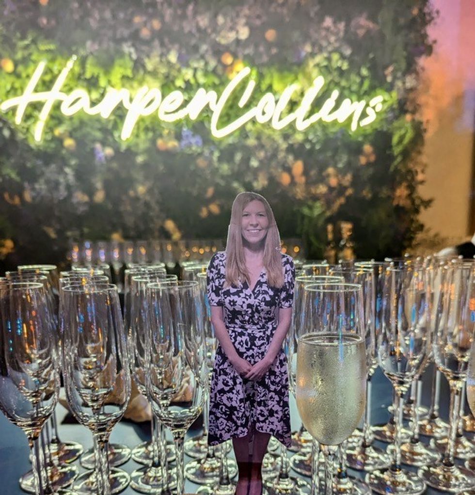 Cardboard cutout in front of glasses