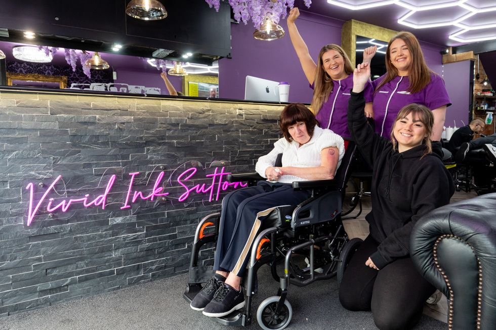 Care home team gets matching tattoo with care home resident
