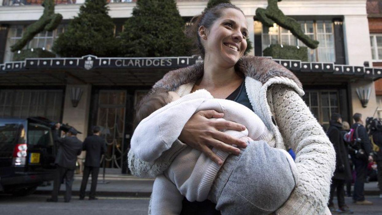 Carla Mastroianni, 30, from west London, breastfeeds her 7-month-old daughter, Sienna