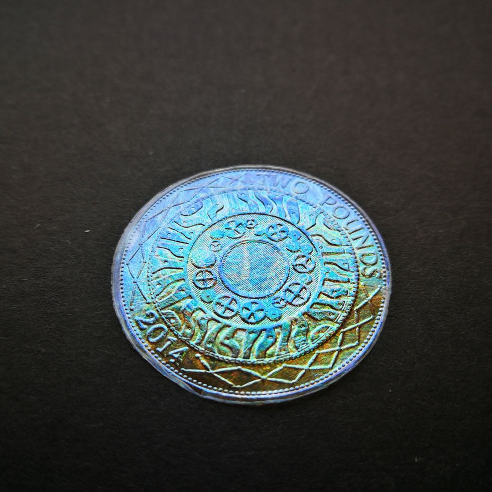 Cellulose suspension dried on a coin as a substrate (Benjamin Droguet/University of Cambridge/PA)