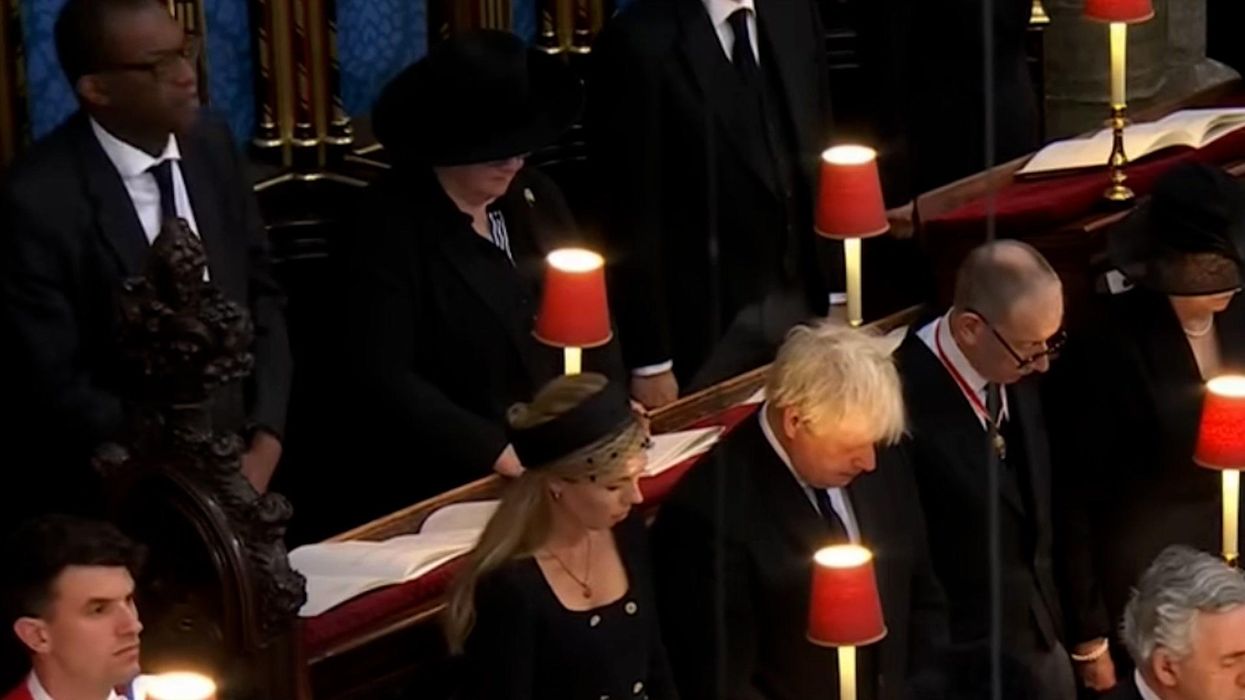 Kwasi Kwarteng under fire for appearing to 'laugh' during Queen's funeral