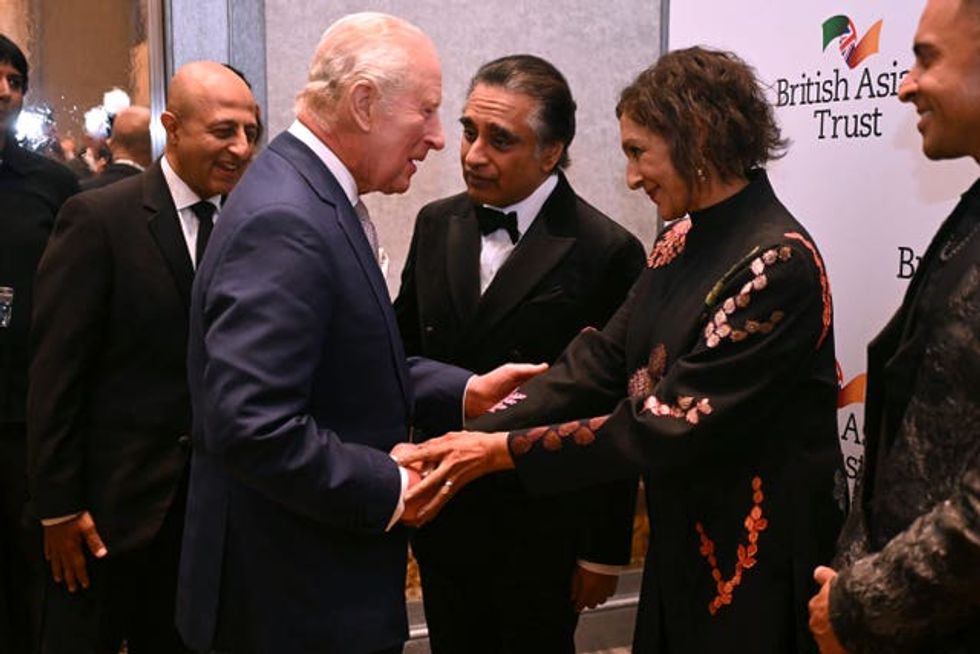 Charles greets Meera Syal at the reception to celebrate the British Asian Trust