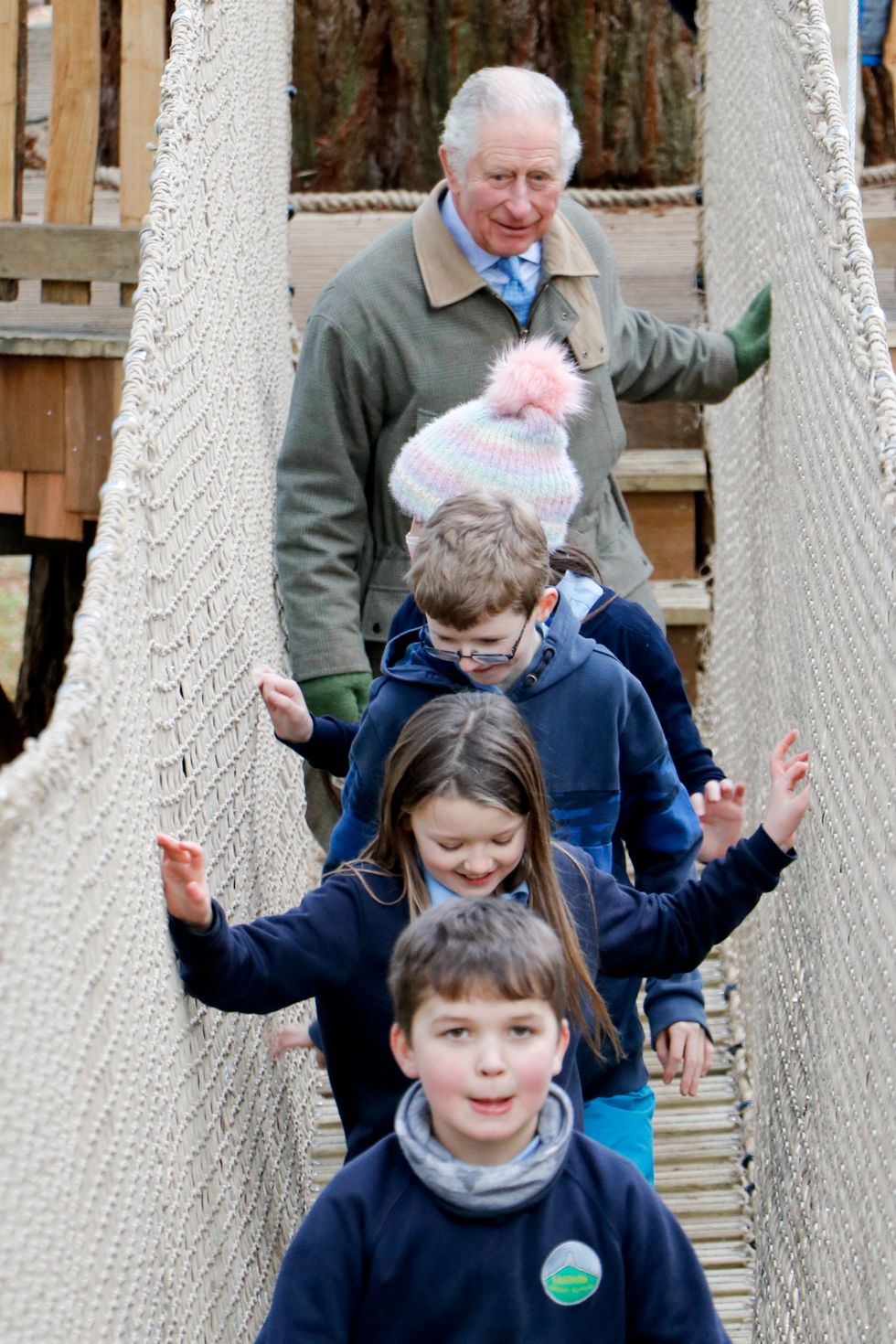Charles walking across one of the bridges