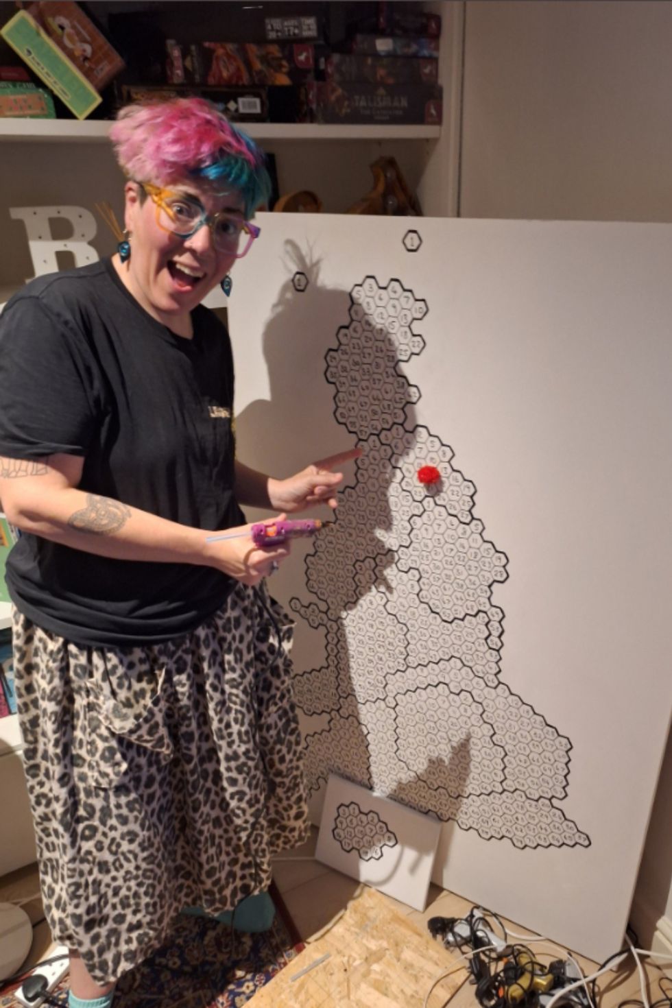 Charlotte Peacock with election map with first pom pom on