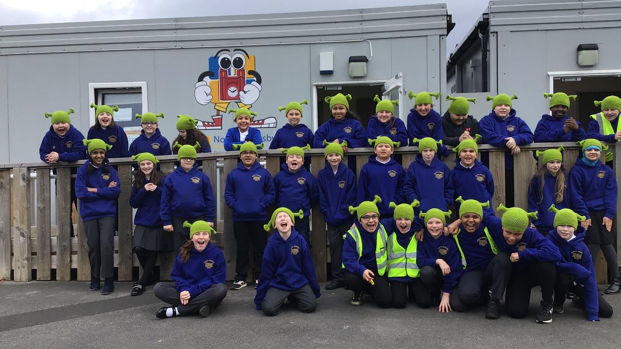 Children at North Ormesby Primary Academy wearing Shrek beanies