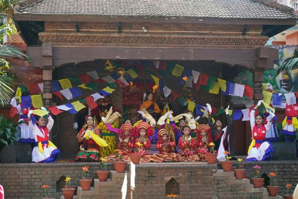 Children at the Mother Teresa School performing a traditional dance