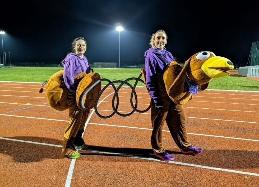 Chris Buckle and Emma Moreton dressed as a slinky dog