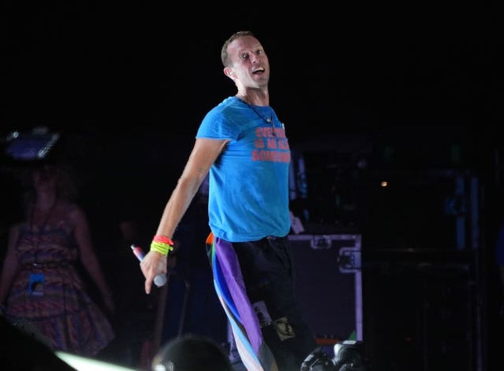 Chris Martin on stage at Glastonbury