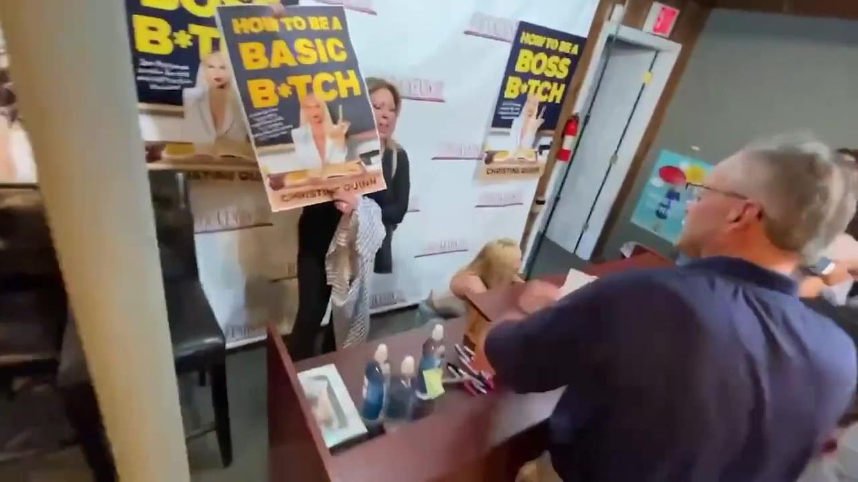 Selling Sunset's Christine cowers under desk as anti-fur protestors crash book signing