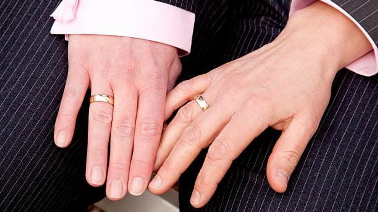 Bride accidentally records wedding guests talking 's***' about her gay marriage in audio guestbook