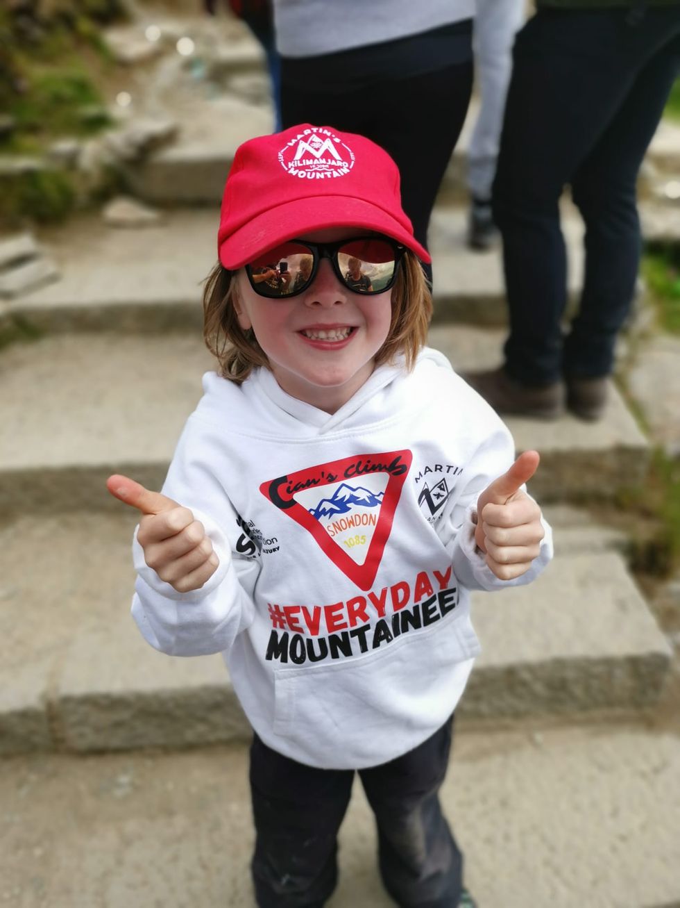 Six-year-old climbing height of Mount Kilimanjaro for spinal injuries charity