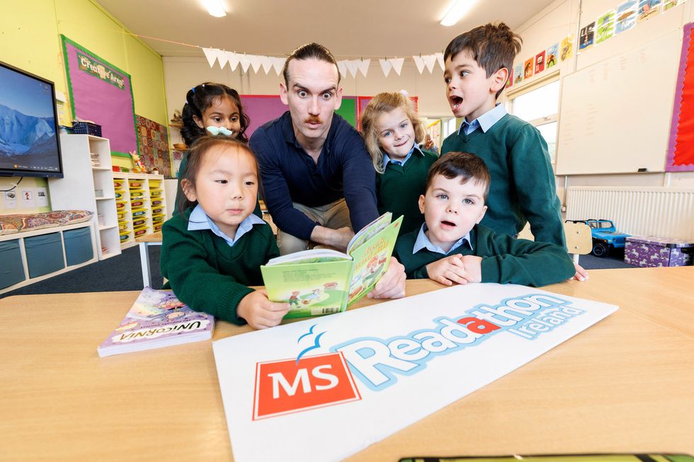 Cillian O'Sullivan with Rathdown School students at the launch of this year's MS Ireland Readathon