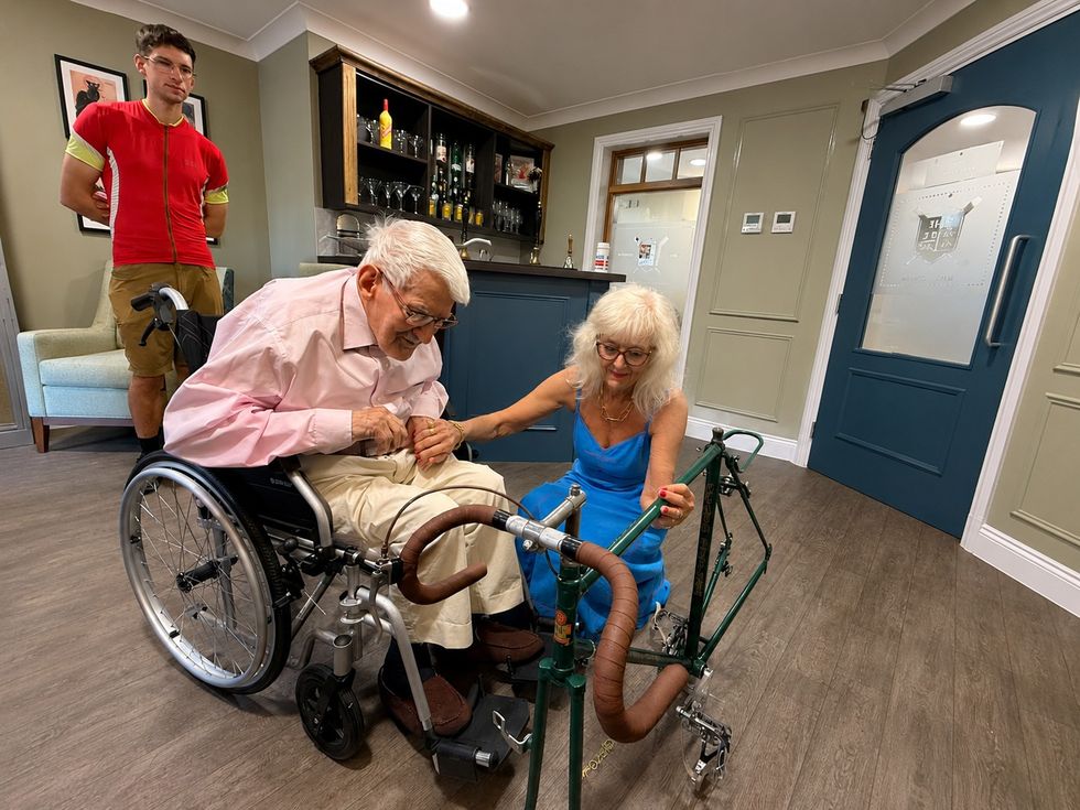 Clifford Craske and Alice Craske with a restored racing bike