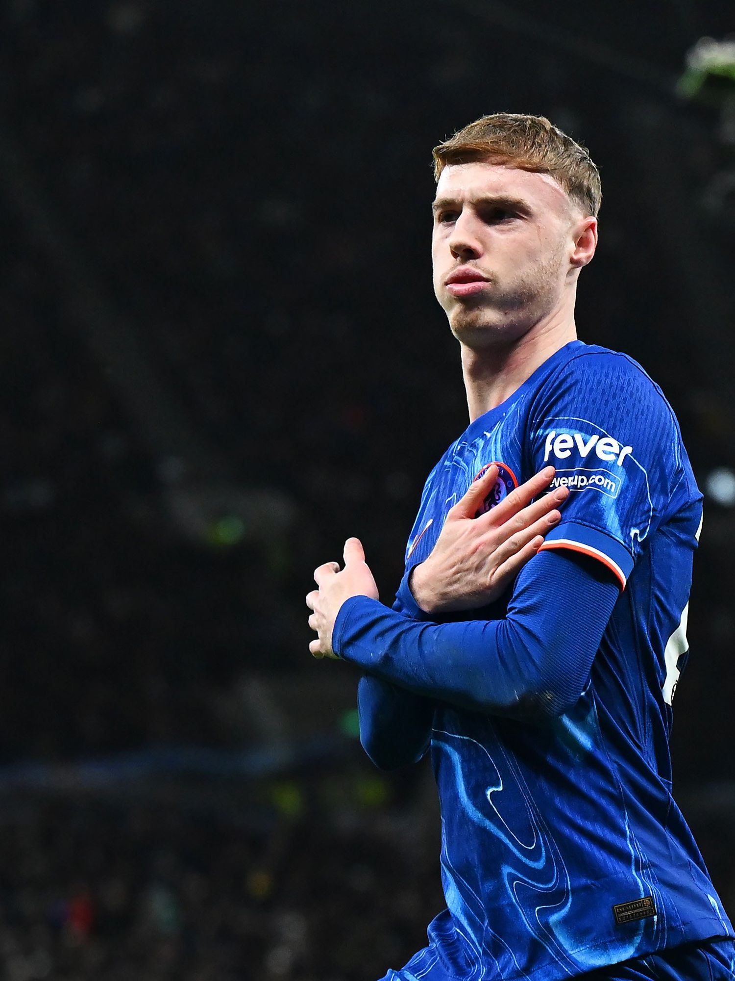 Cole Palmer of Chelsea celebrates scoring his team's second goal from the penalty spot during the Premier League match between Tottenham Hotspur FC and Chelsea FC at Tottenham Hotspur Stadium on December 08, 2024 in London, England