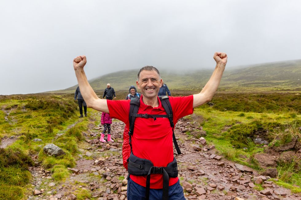 Doctor scales peaks across 32 counties in fundraising tribute to sister-in-law