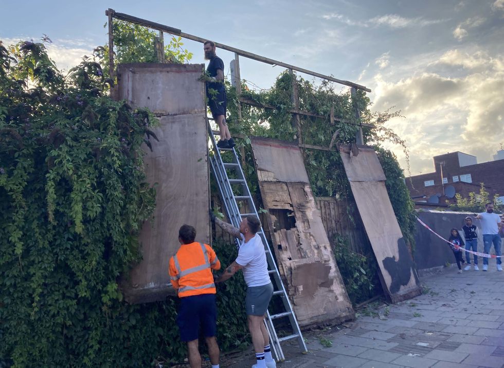 Crowds boo as sixth Banksy artwork of cat removed hours after being unveiled