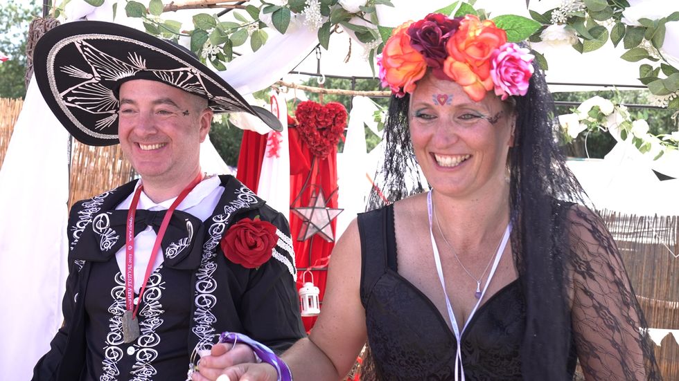 Couple in handfasting ceremony at Glastonbury