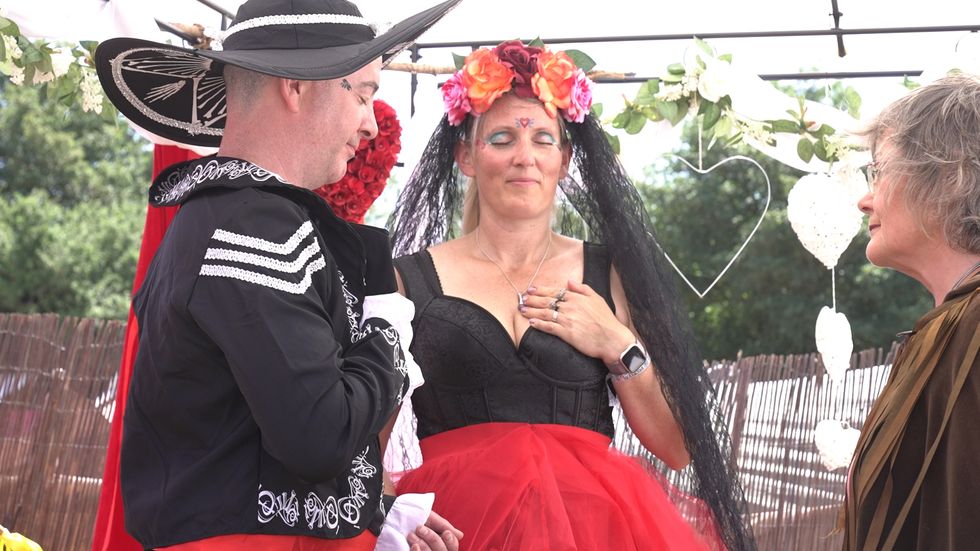 Couple in handfasting ceremony at Glastonbury