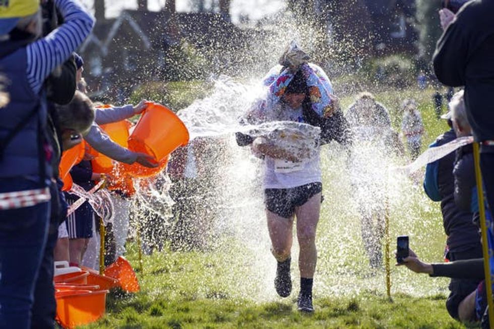Couples ran the gauntlet (Steve Parsons/PA)
