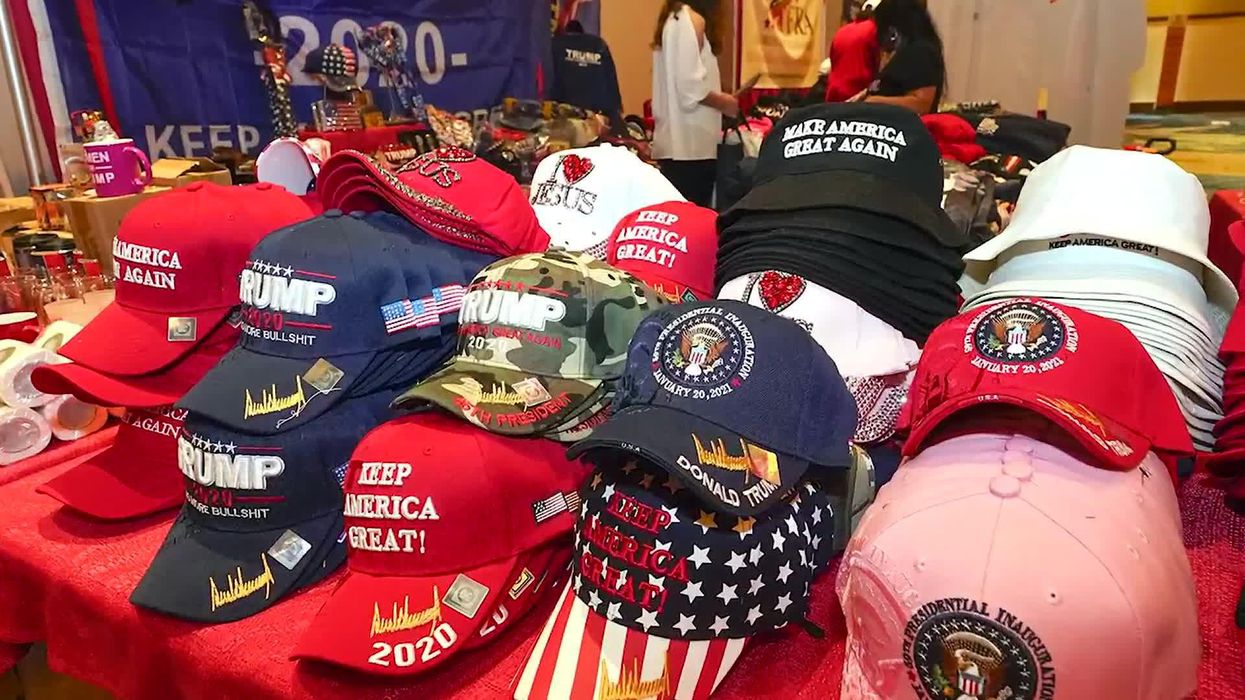 Bizarre CPAC exhibit features Jan 6 'prisoner' behind bars and silent disco headphones