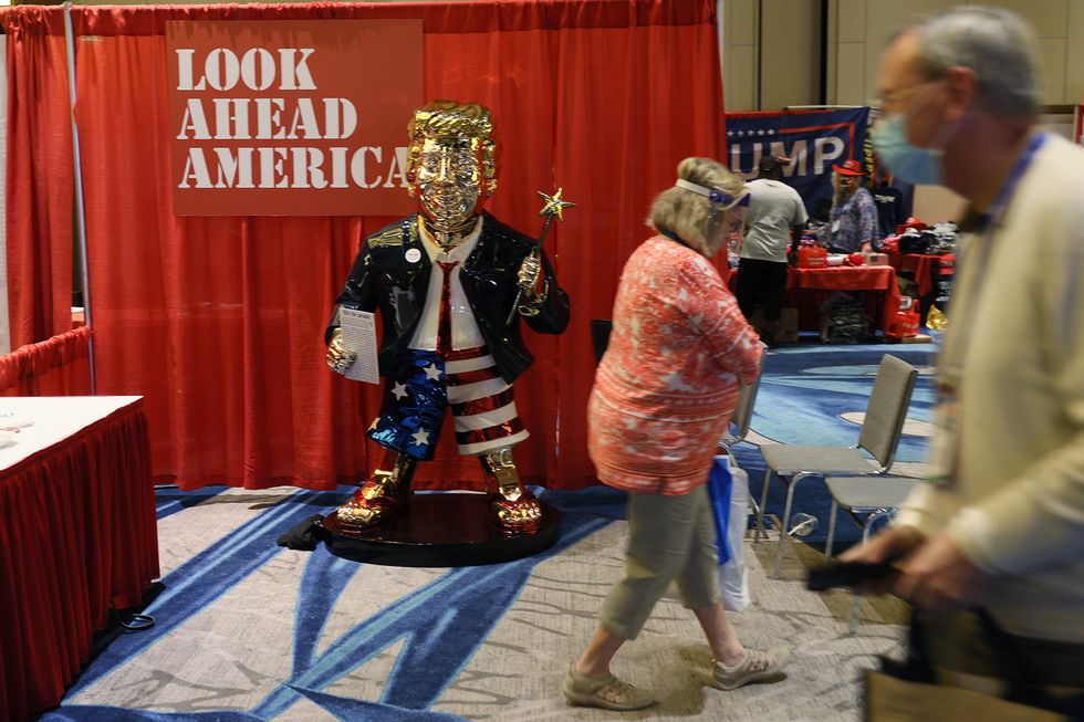 CPAC attendees were able to get a picture with the man that is famously a fan of tacky gold interiors