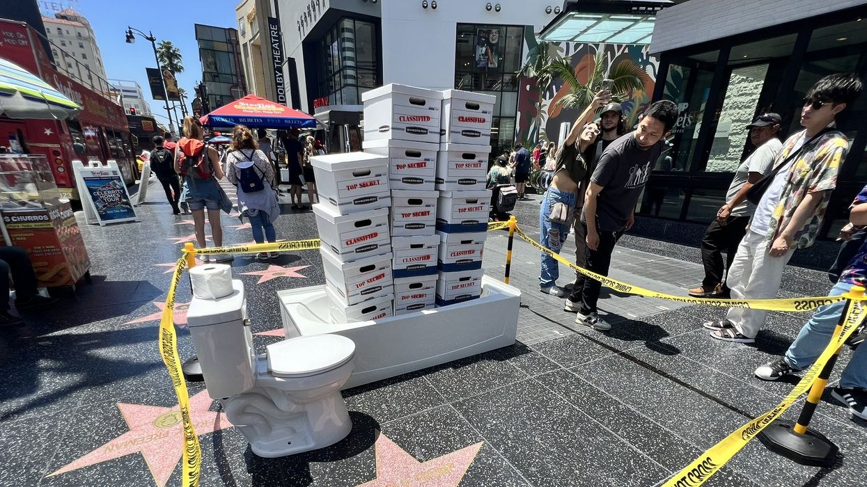 Crime scene tape, a toilet, and a bathtub filled with 'top secret' boxes surround Donald Trump's Hollywood Walk of Fame star