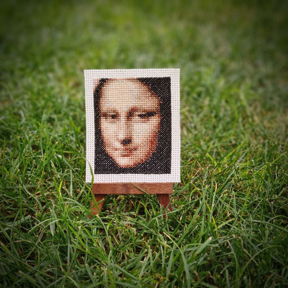Cross-stitched Mona Lisa on a tiny easel (Elcin Ozcan/PA).